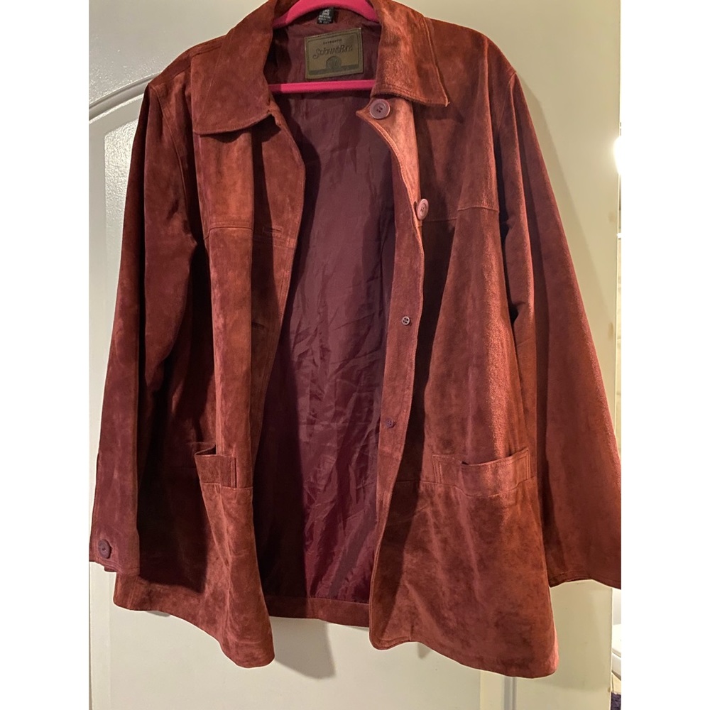 At John’s leather coat